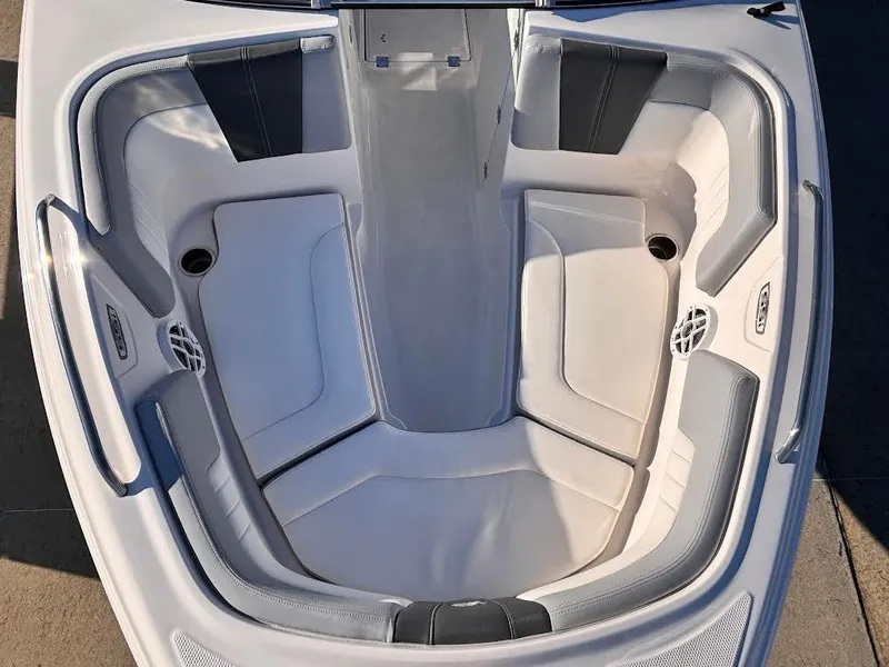Slide: The Image of Interior of 2022 Chaparral 23 SSi OB with gray and white seating. - 14