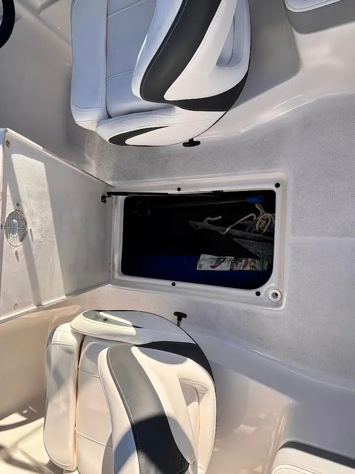 Slide: The Image of Interior of a 2022 Chaparral 23 SSi OB boat with seating. - 16