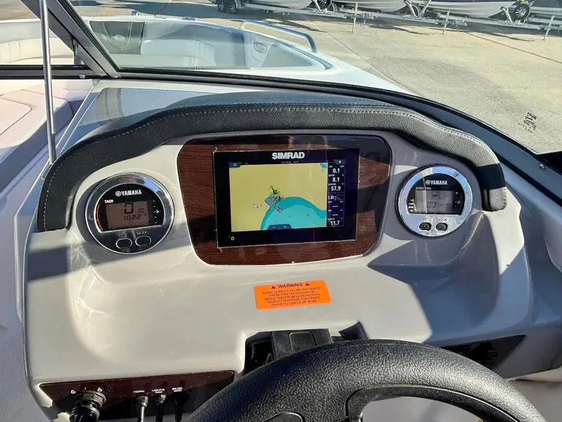 Slide: The Image of Dashboard of 2022 Chaparral 23 SSi OB with Simrad display. - 17