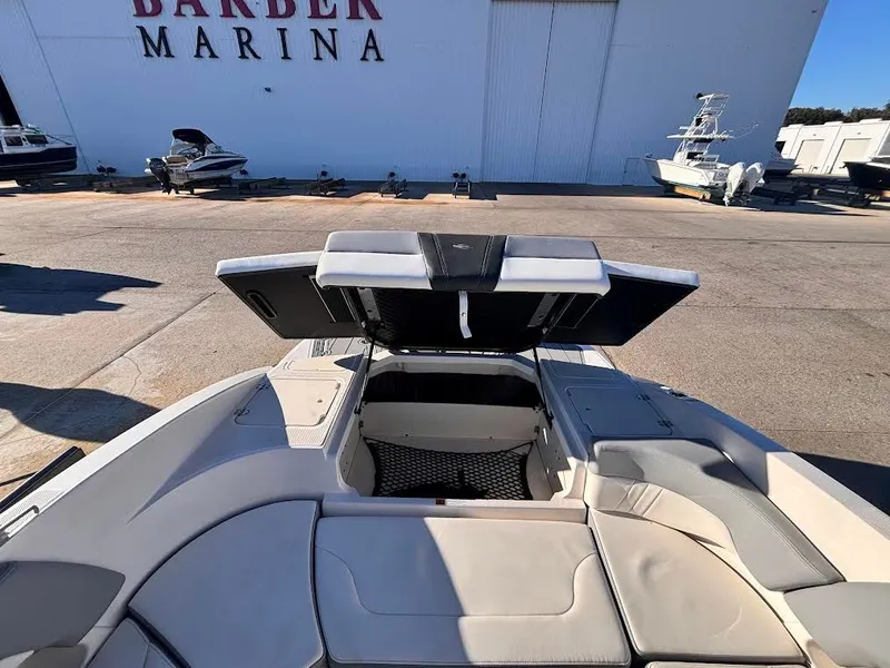 Slide: The Image of Chaparral 23 SSi OB 2022 boat with open storage at Barber Marina. - 6