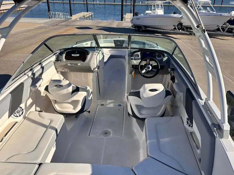 Slide: The Image of Interior of 2022 Chaparral 23 SSi OB boat at dock. - 8