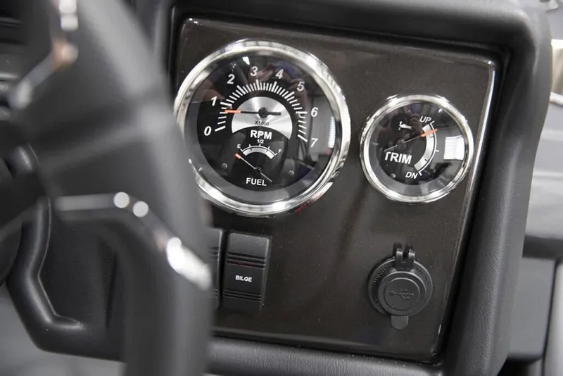 Slide: The Image of Dashboard of 2026 Veranda VR235L with RPM and trim gauges. - 7