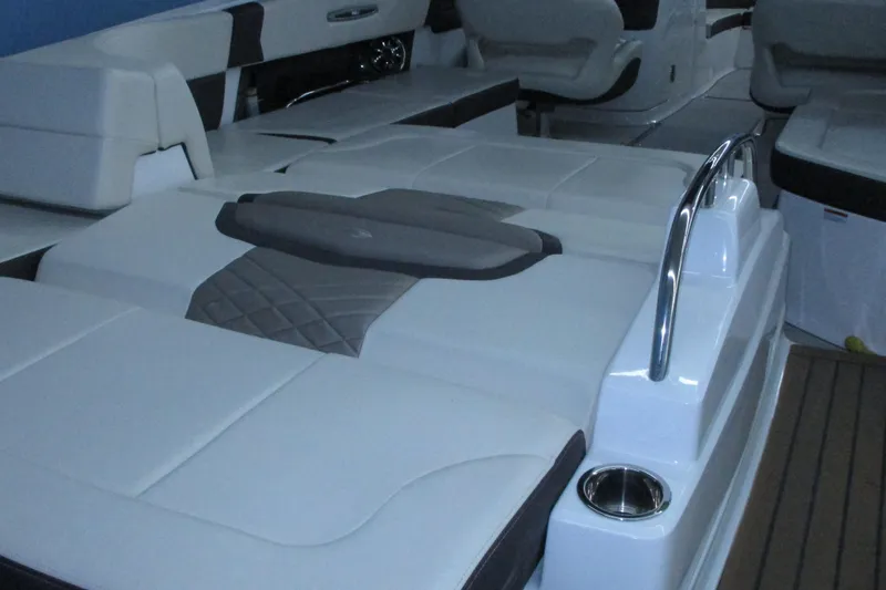 Slide: The Image of 2018 Chaparral 287 SSX boat interior with luxurious seating and sleek design. - 4