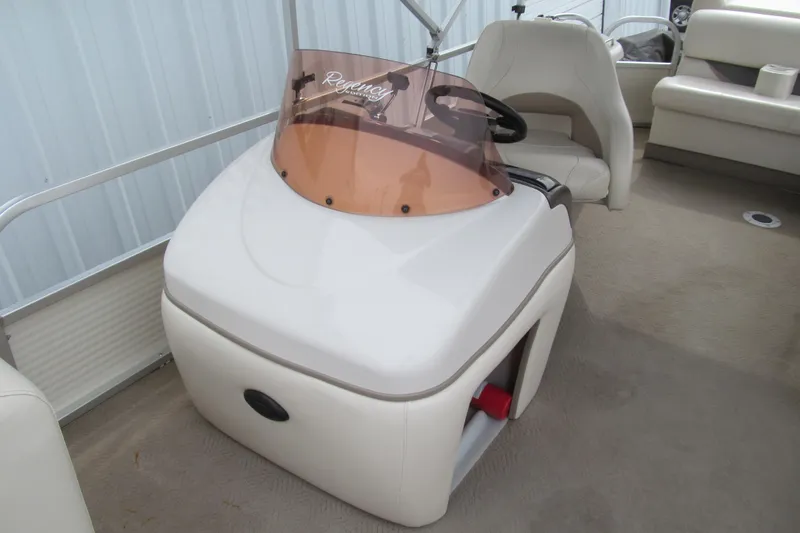 Slide: The Image of 2008 Sun Tracker Party Barge 25 I/O Regency Edition interior with steering console. - 10