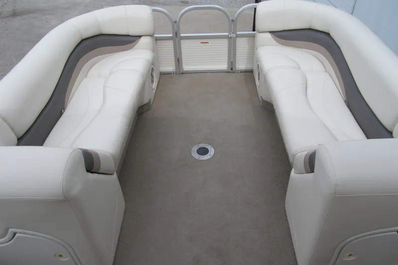 Slide: The Image of 2008 Sun Tracker Party Barge 25 I/O Regency Edition interior with plush seating. - 7