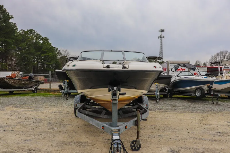 Slide: The Image of 2006 Yamaha Boats SX210 on trailer in outdoor storage lot. - 7