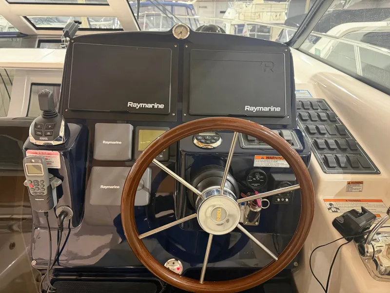 Slide: The Image of Tiara Yachts 4300 Sovran 2008 helm with Raymarine equipment. - 12