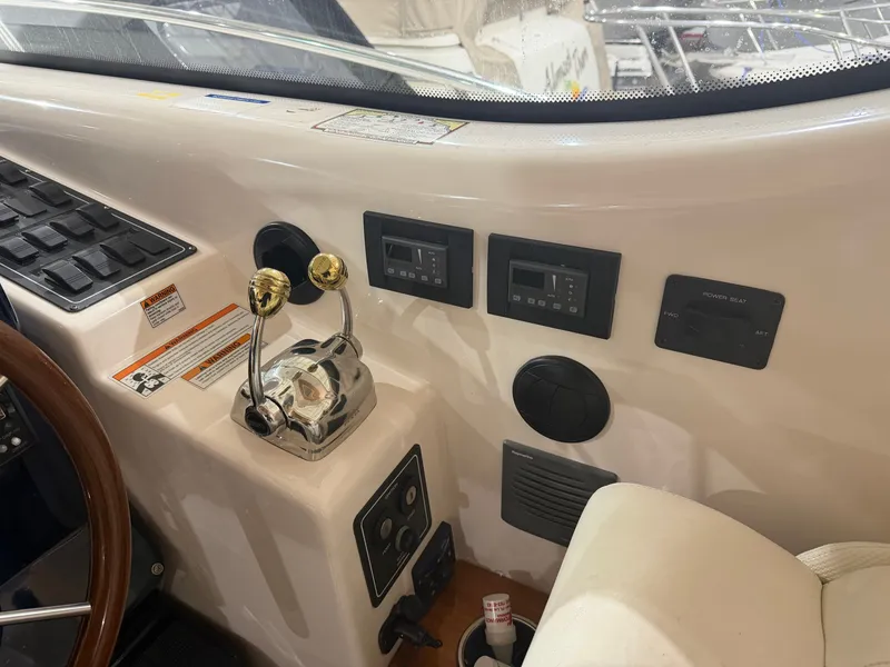 Slide: The Image of Tiara Yachts 4300 Sovran 2008 helm with control panel. - 13
