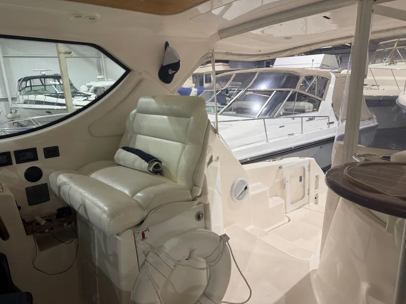 Slide: The Image of Interior of a 2008 Tiara Yachts 4300 Sovran with leather seating. - 15
