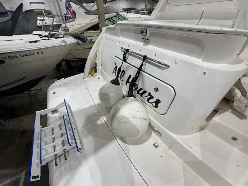 Slide: The Image of 2008 Tiara Yachts 4300 Sovran docked with fenders. - 2