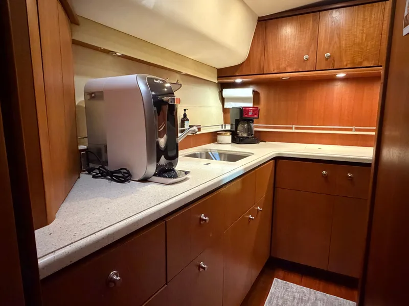 Slide: The Image of Tiara Yachts 4300 Sovran 2008 kitchen area with coffee maker. - 22
