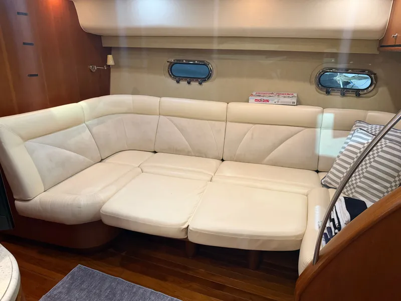 Slide: The Image of Interior of 2008 Tiara Yachts 4300 Sovran with beige sofa. - 23