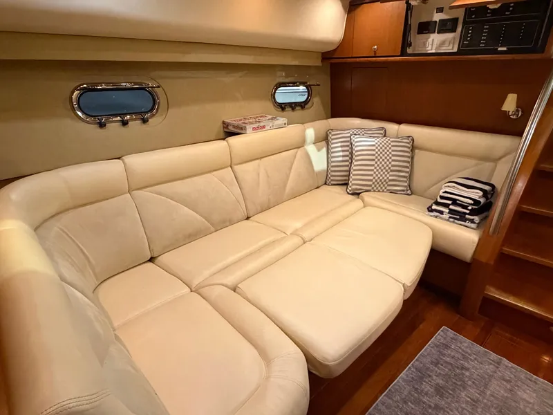 Slide: The Image of Interior of 2008 Tiara Yachts 4300 Sovran with beige sofa. - 24