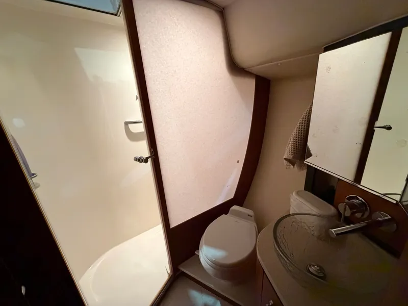 Slide: The Image of Tiara Yachts 4300 Sovran 2008 bathroom with shower and sink. - 27