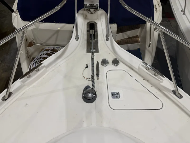 Slide: The Image of Foredeck of a 2008 Tiara Yachts 4300 Sovran with anchor windlass. - 34