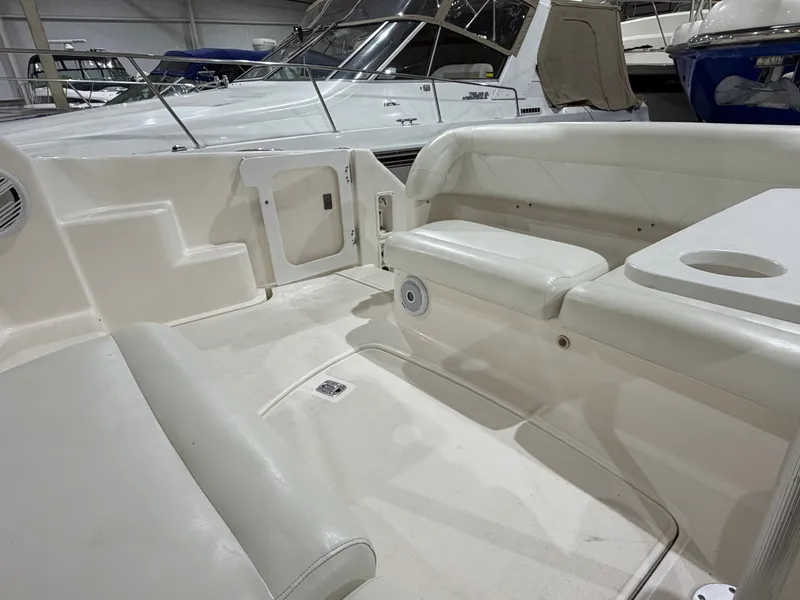 Slide: The Image of Interior of a 2008 Tiara Yachts 4300 Sovran with white seating. - 6