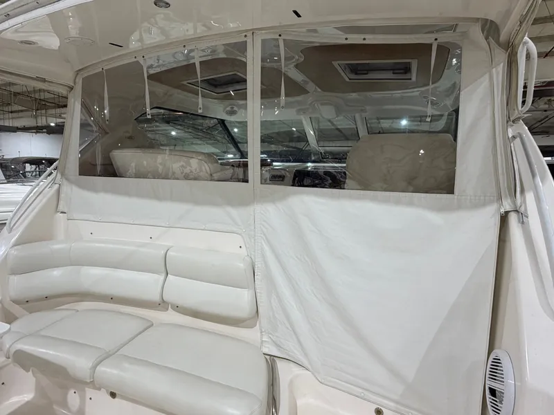 Slide: The Image of Interior of a 2008 Tiara Yachts 4300 Sovran with seating area. - 7