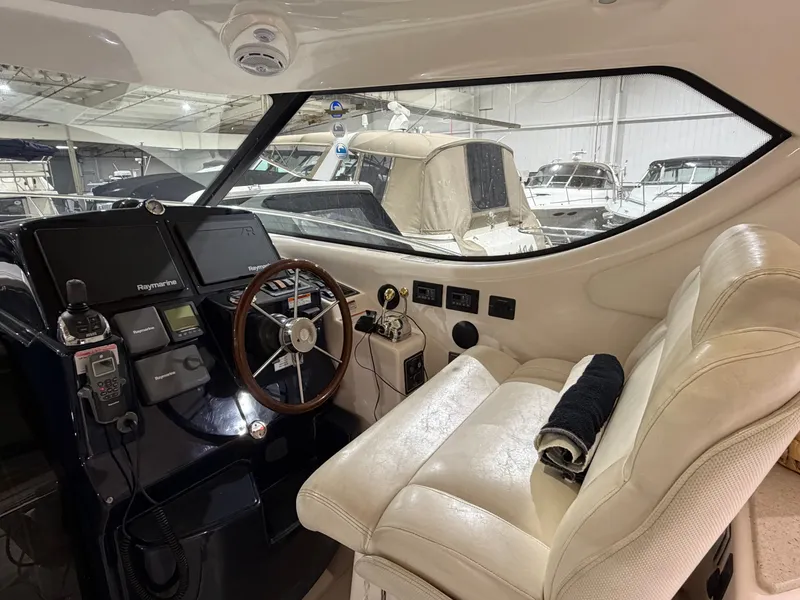 Slide: The Image of Interior of 2008 Tiara Yachts 4300 Sovran with helm console. - 9
