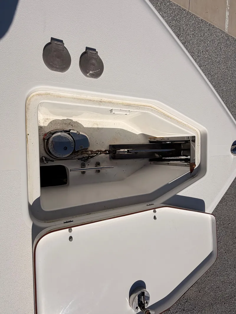 Slide: The Image of Anchor compartment of a 2016 Sea Hunt Gamefish 27 boat. - 12