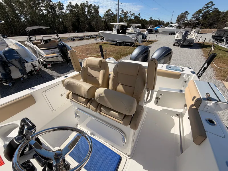 Slide: The Image of Interior view of a 2016 Sea Hunt Gamefish 27 boat outdoors. - 19