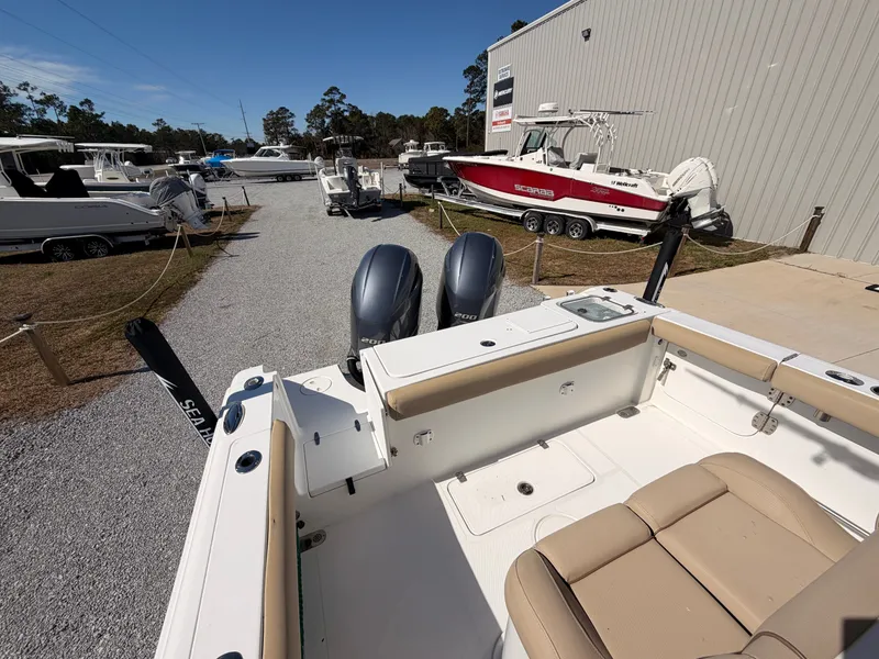 Slide: The Image of 2016 Sea Hunt Gamefish 27 in a boat sales lot. - 21