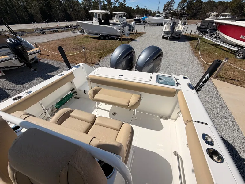 Slide: The Image of Interior view of a 2016 Sea Hunt Gamefish 27 boat outdoors. - 24