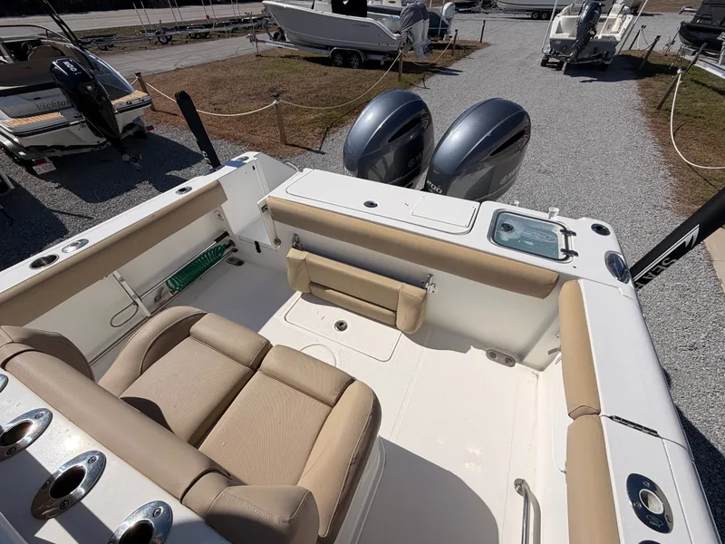 Slide: The Image of Interior of a 2016 Sea Hunt Gamefish 27 boat with dual engines. - 25