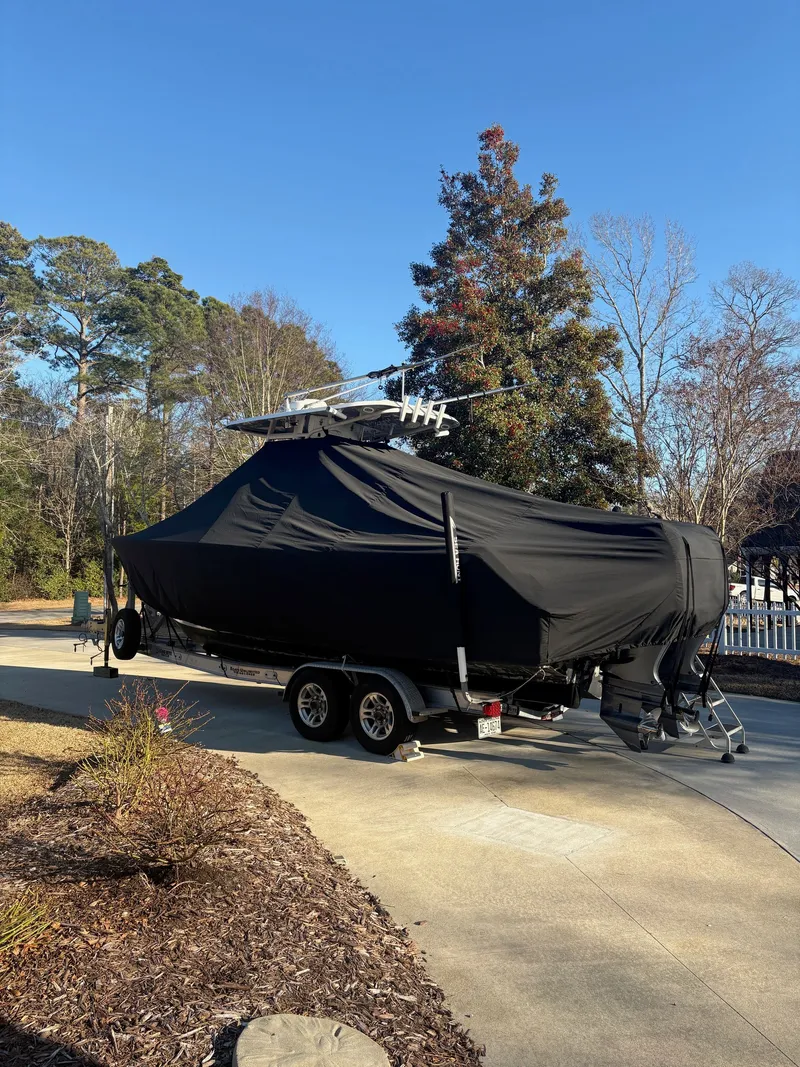 Slide: The Image of Covered 2016 Sea Hunt Gamefish 27 boat on trailer. - 33