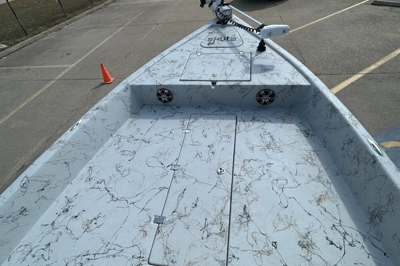 Slide: The Image of 2026 Skuta 24 Vista boat deck with marbled design and mounted equipment. - 15
