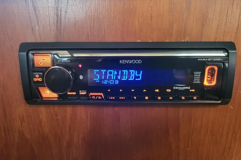 Slide: The Image of Kenwood stereo system in 1984 Sea Sprite 34 boat, displaying "Standby" mode. - 26