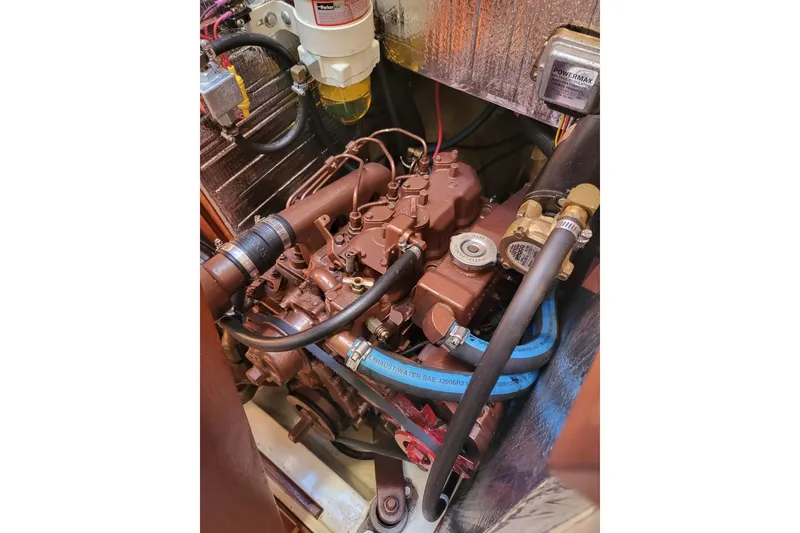 Slide: The Image of Engine compartment of a 1984 Sea Sprite 34 sailboat, showcasing detailed mechanical components. - 7