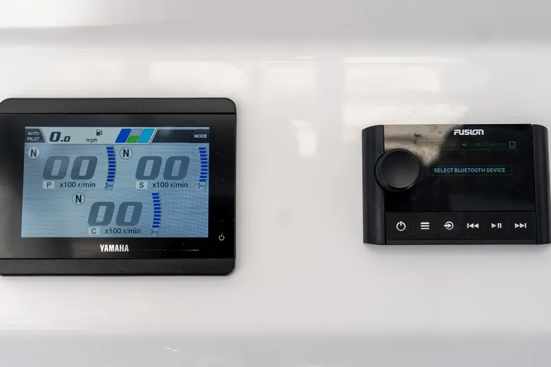 Slide: The Image of Dashboard of 2024 Everglades 395 Center Console with Yamaha and Fusion displays. - 32