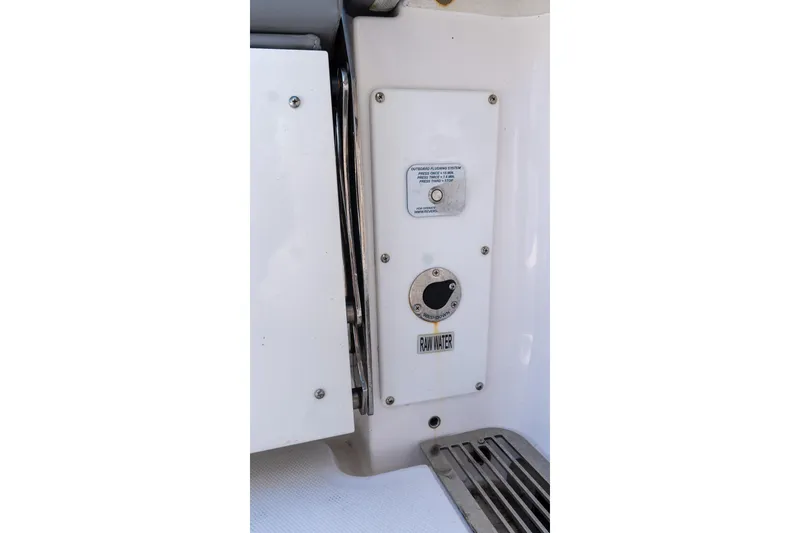 Slide: The Image of 2024 Everglades 395 Center Console boat's raw water access panel. - 41