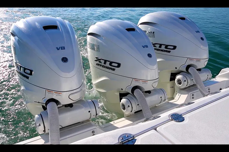 Slide: The Image of Triple Yamaha XTO Offshore engines on 2024 Everglades 395 Center Console boat. - 47