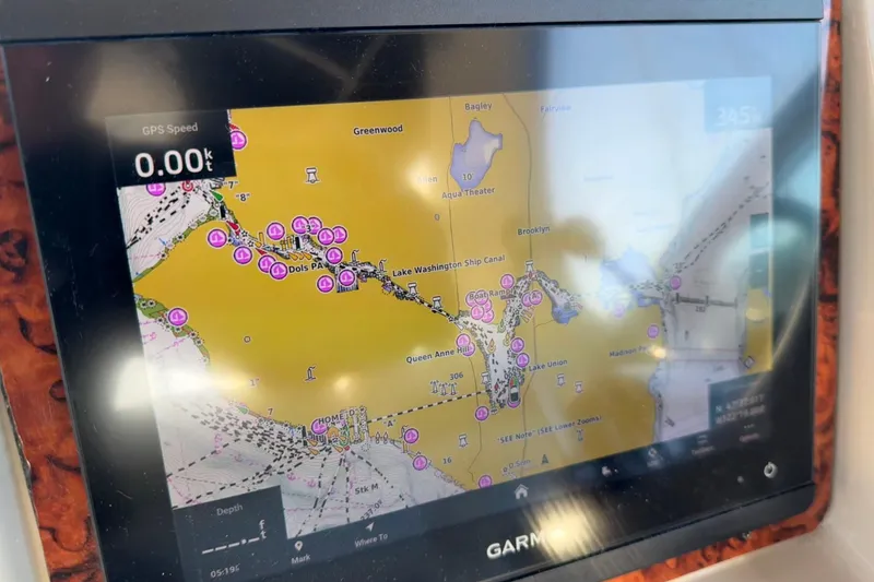 Slide: The Image of Garmin GPS display on 2006 Sea Ray Sundancer 320, showing nautical map and speed. - 13