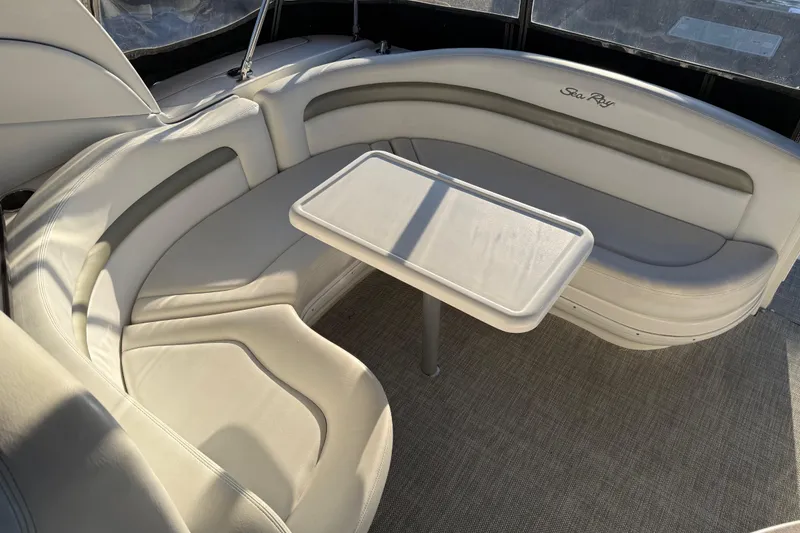 Slide: The Image of Luxurious seating area on a 2006 Sea Ray Sundancer 320 yacht with a central table. - 17