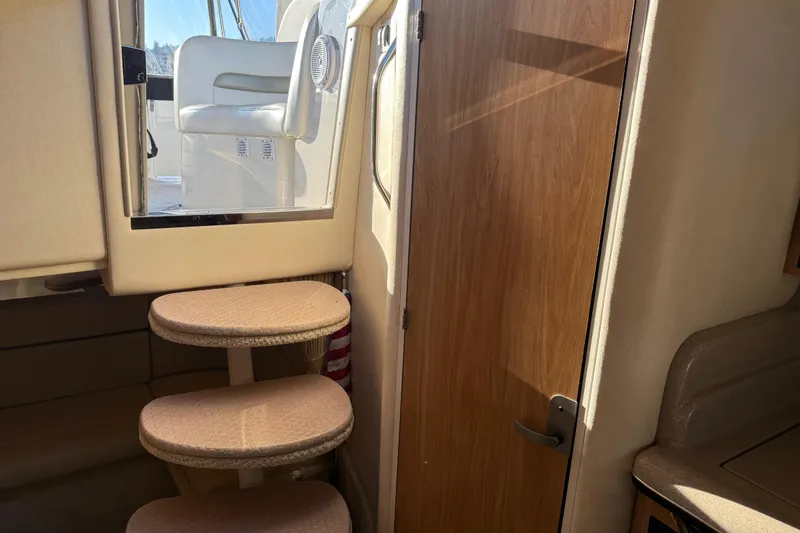 Slide: The Image of Interior of 2006 Sea Ray Sundancer 320 with steps and wooden door. - 38
