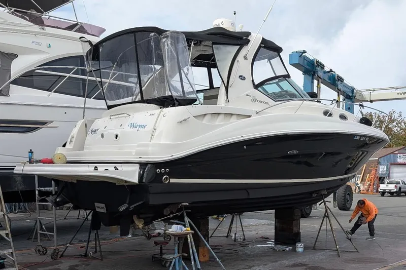 Slide: The Image of 2006 Sea Ray Sundancer 320 yacht on dry dock for maintenance. - 58