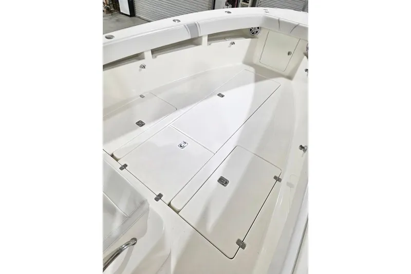 Slide: The Image of 2019 SeaVee 320B boat deck with storage compartments, white finish. - 10