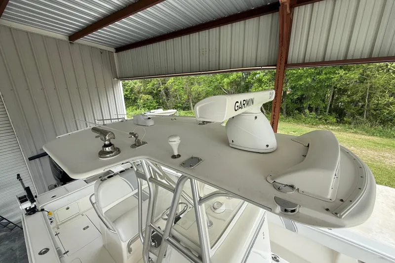 Slide: The Image of 2019 SeaVee 320B boat with Garmin radar, under metal shelter. - 11