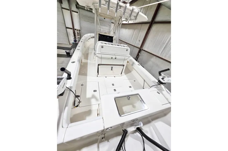 Slide: The Image of 2019 SeaVee 320B boat interior, showcasing spacious deck and storage compartments. - 5