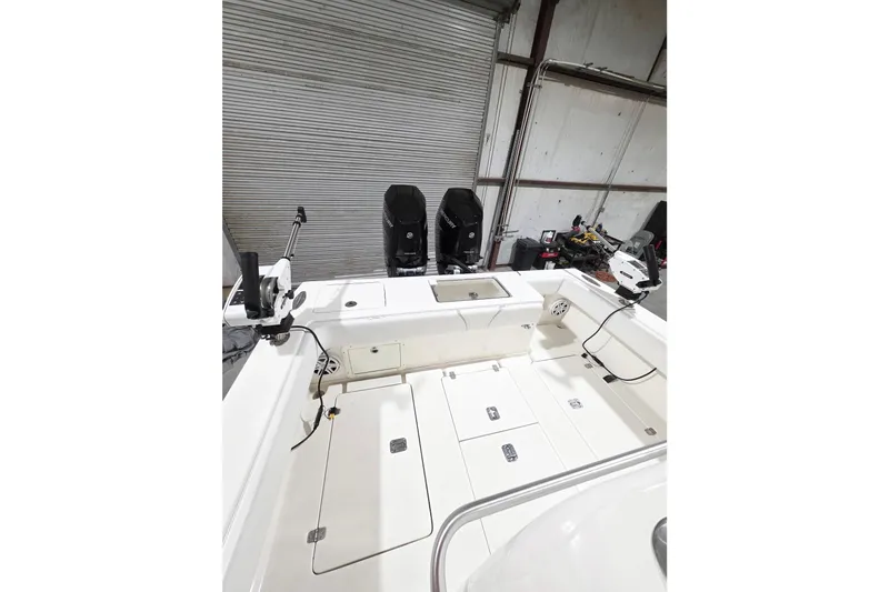 Slide: The Image of 2019 SeaVee 320B boat interior with storage compartments and fishing equipment. - 8