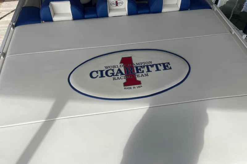 Slide: The Image of 1998 Cigarette 38' Top Gun boat with "World Champion Cigarette Racing Team" logo. - 16