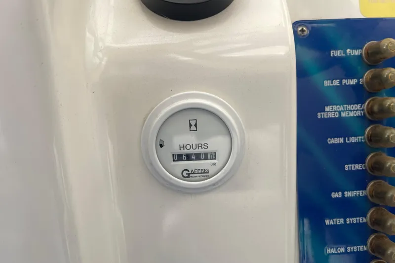 Slide: The Image of Hour meter on 1998 Cigarette 38' Top Gun boat dashboard, showing 640 hours. - 26