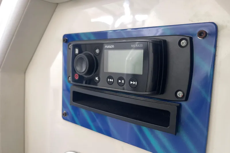 Slide: The Image of Fusion MS-RA55 stereo system on 1998 Cigarette 38' Top Gun boat dashboard. - 34