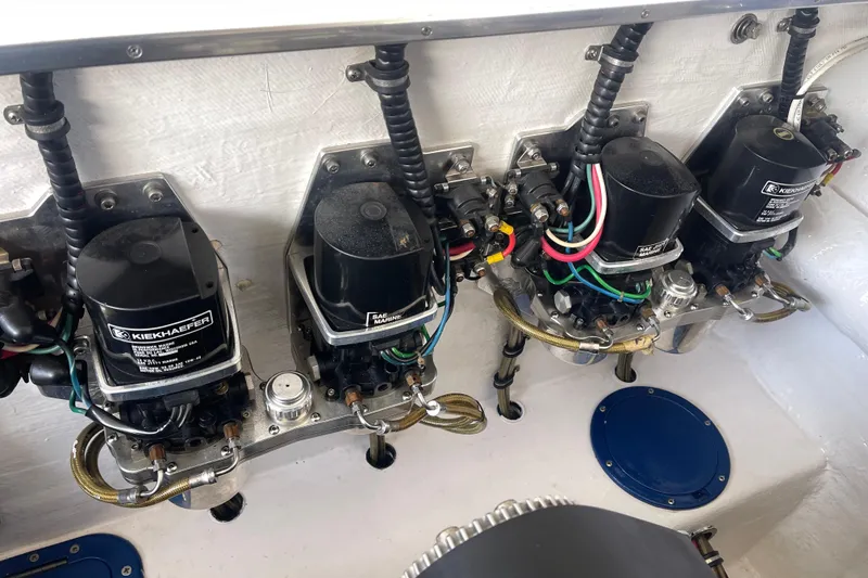 Slide: The Image of Engine components of a 1998 Cigarette 38' Top Gun boat, featuring Kiekhaefer systems. - 50