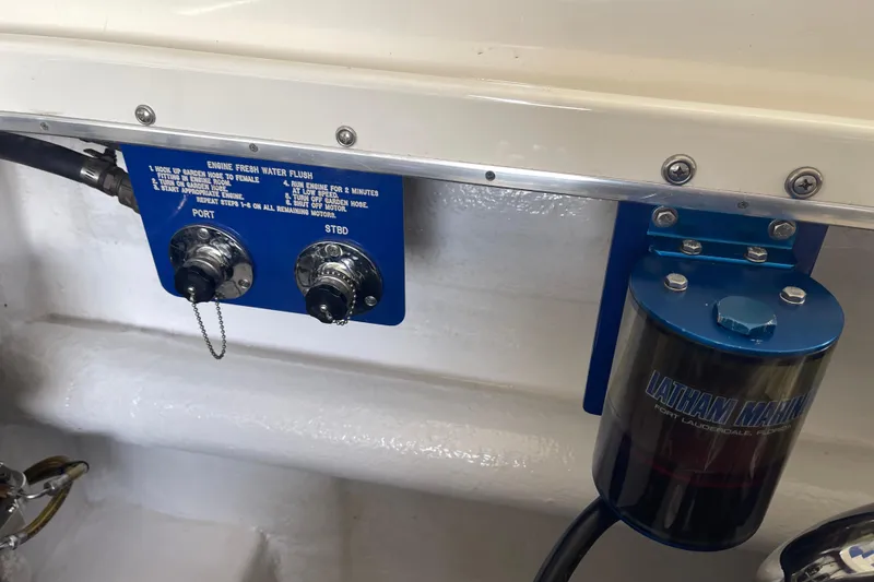 Slide: The Image of Engine compartment of 1998 Cigarette 38' Top Gun with water flush system and Latham Marine filter. - 51