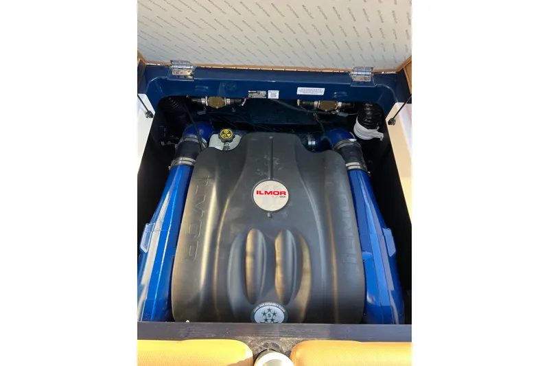 Slide: The Image of 2022 MasterCraft XT25 engine compartment featuring Ilmor engine components. - 9