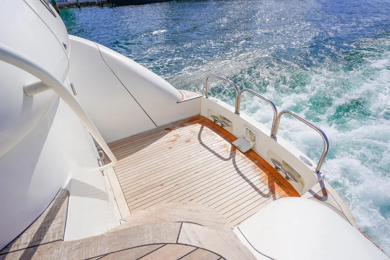 Slide: The Image of Sleek deck of 2004 Lazzara 80 SL yacht with ocean view. - 11