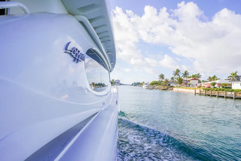 Slide: The Image of Luxury yacht Lazzara 80 SL cruising near tropical shoreline, 2004 model. - 18